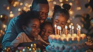 Family birthday celebration with candles and warm lights